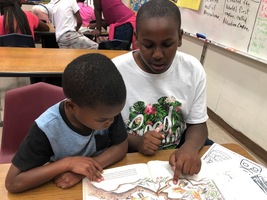 Mentoring Initiative - 6th grade students read to 1st Graders!